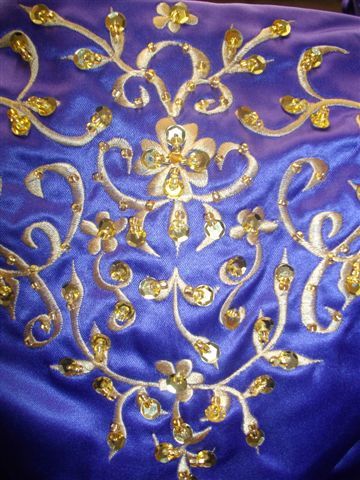 Embroidery and sequins on bodice