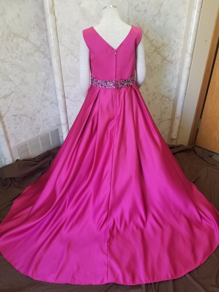 pink pageant dress with beaded waistline