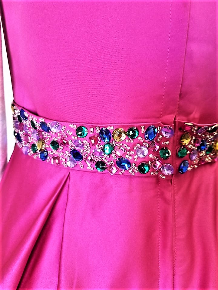 pink pageant dress with beaded waistline