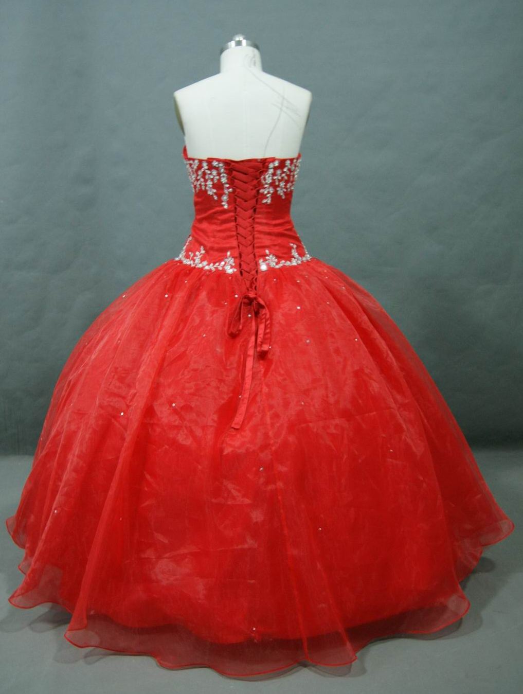 Red prom dress with beaded applique