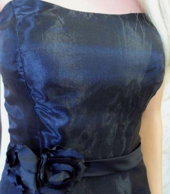 black dress with matching flower waistband
