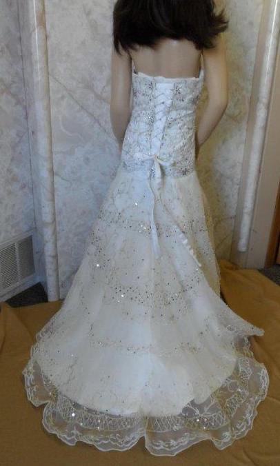 heavy embroidery and beaded miniature bride gown