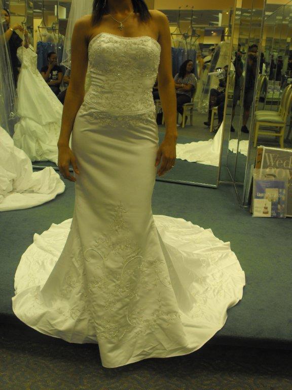 strapless mermaid bridal gown with elaborate embroidery and beading