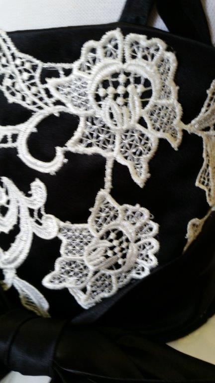 black bodice with ivory lace applique