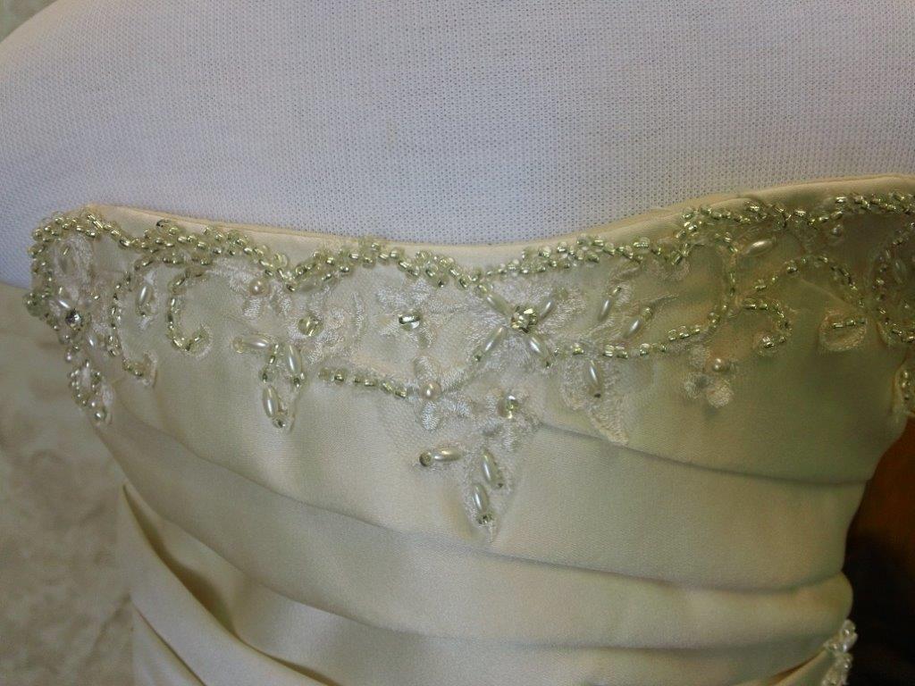 pleated bodice with beaded embroidery