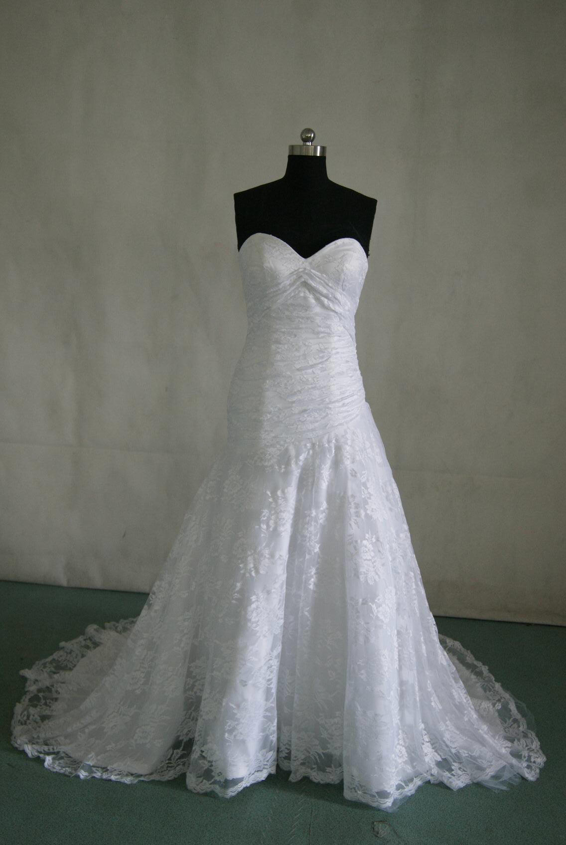 White lace wedding gown with strapless sweetheart neckline