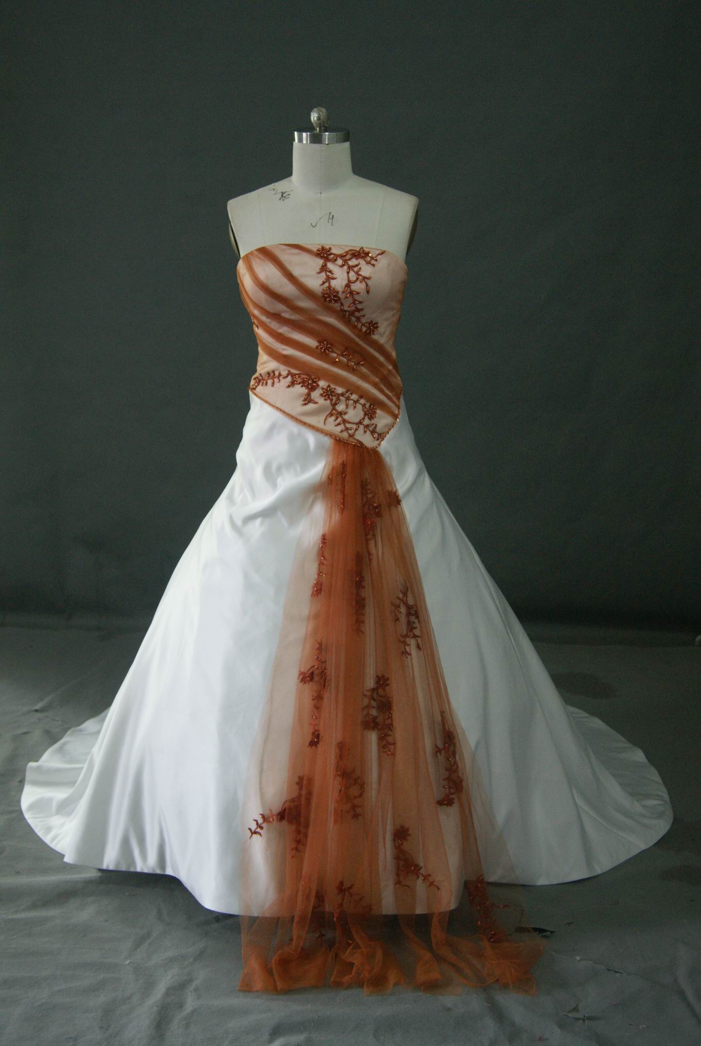 ivory wedding gown with burnt orange